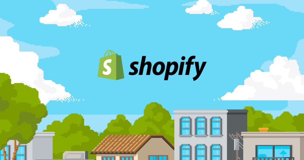 Équipe e-commerce découvrant la nouvelle interface Shopify sur un ordinateur portable